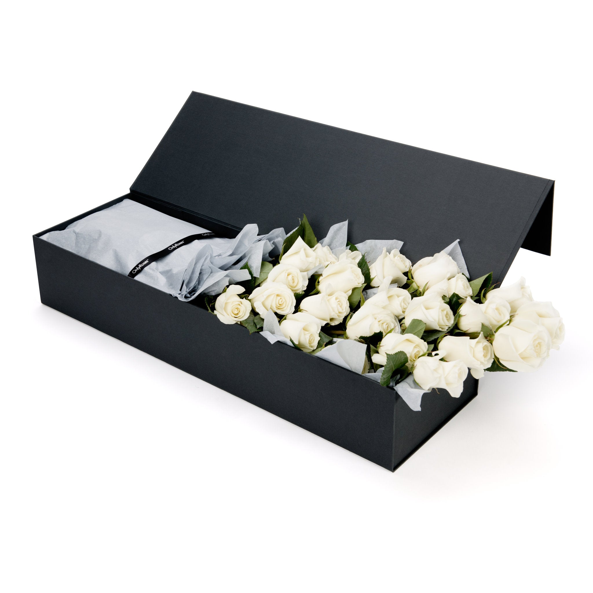 Black gift box with white roses on a white background