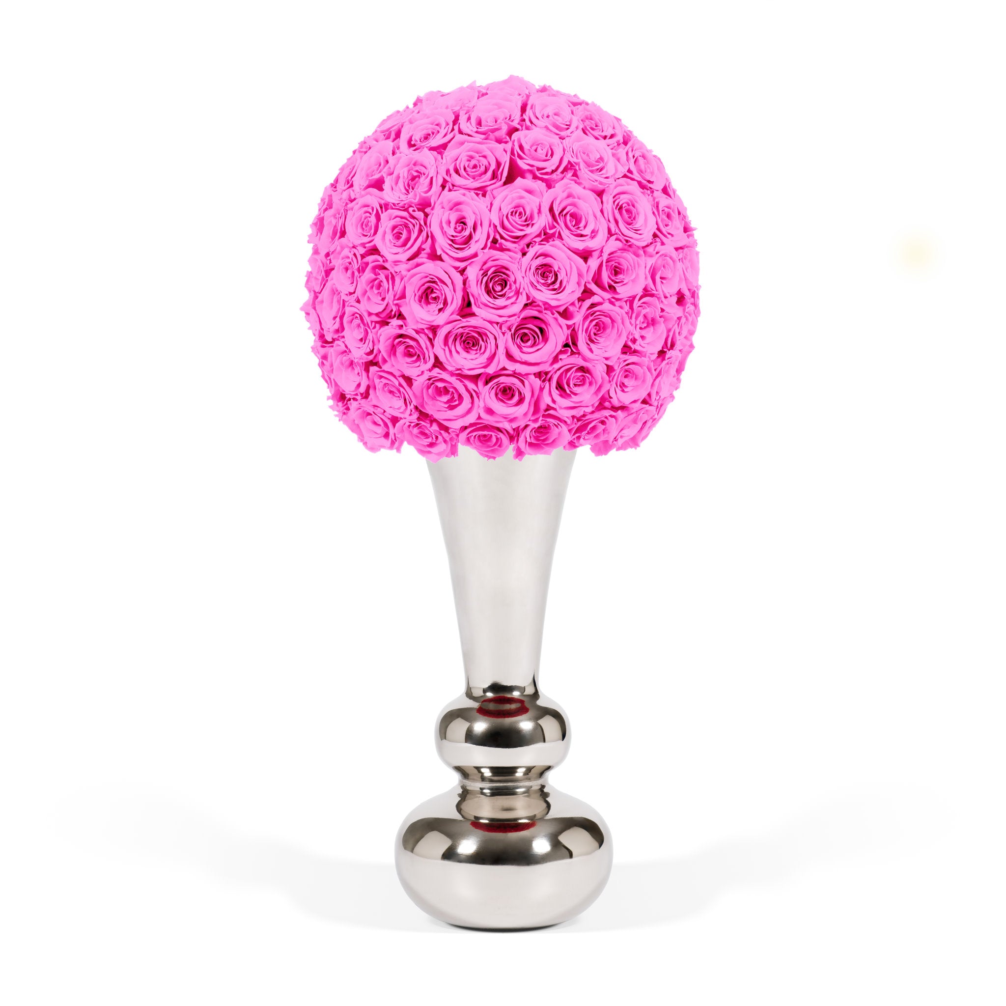 Decorative object with pink rose ball on a silver base against a white background