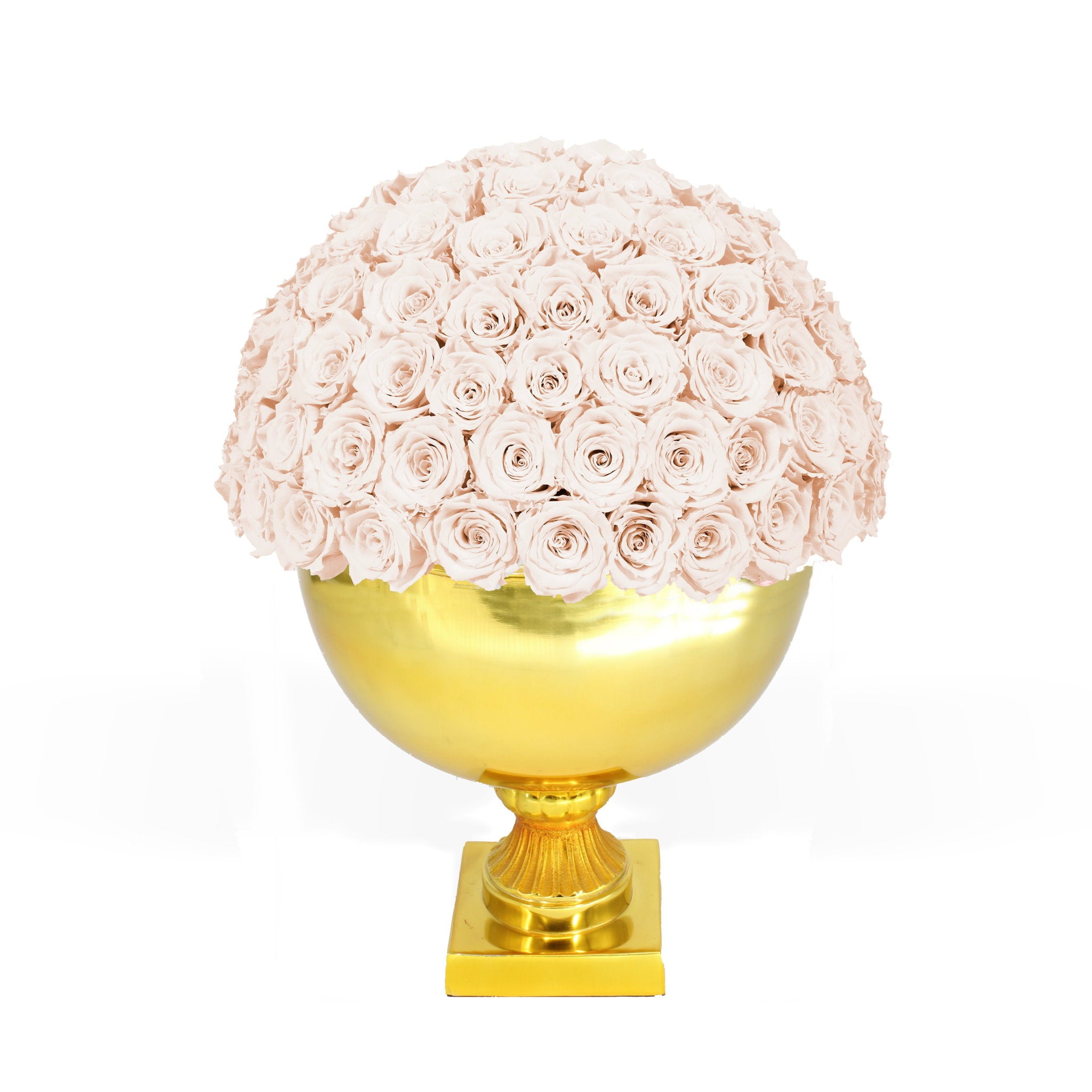 Decorative vase with pink roses on a gold base against a white background