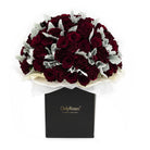 Bouquet of red roses and white flowers in a black box with 'Only Roses' branding on a white background.
