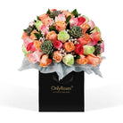 Colorful bouquet of flowers in a black box with 'Only Roses' branding on a white background
