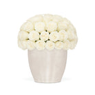 White vase filled with white roses on a white background