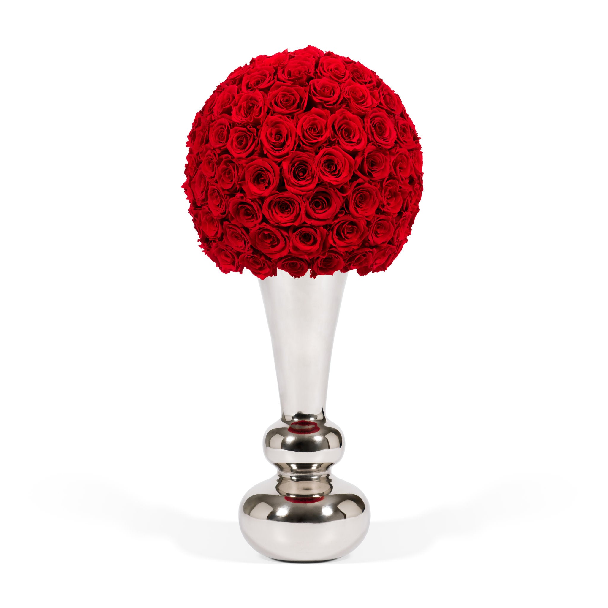 Silver vase with a large ball of red roses on a white background