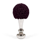 Decorative vase with dark purple roses on a white background