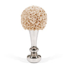 Decorative vase with beige roses on a white background