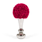 Decorative vase with pink rose ball on a white background