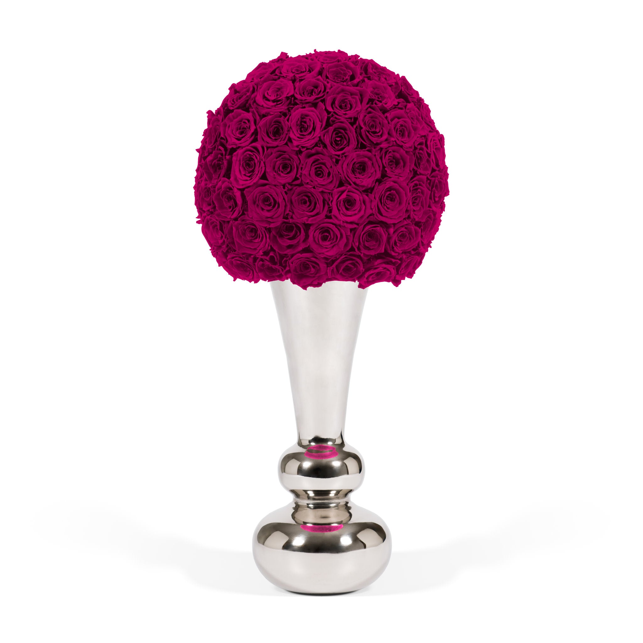 Decorative object with pink rose ball on a silver stand against a white background