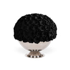 Black rose arrangement in a silver pedestal bowl on a white background