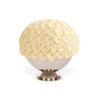 Decorative vase with cream-colored roses on a white background