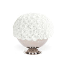 Decorative sphere with white rose pattern on a white background