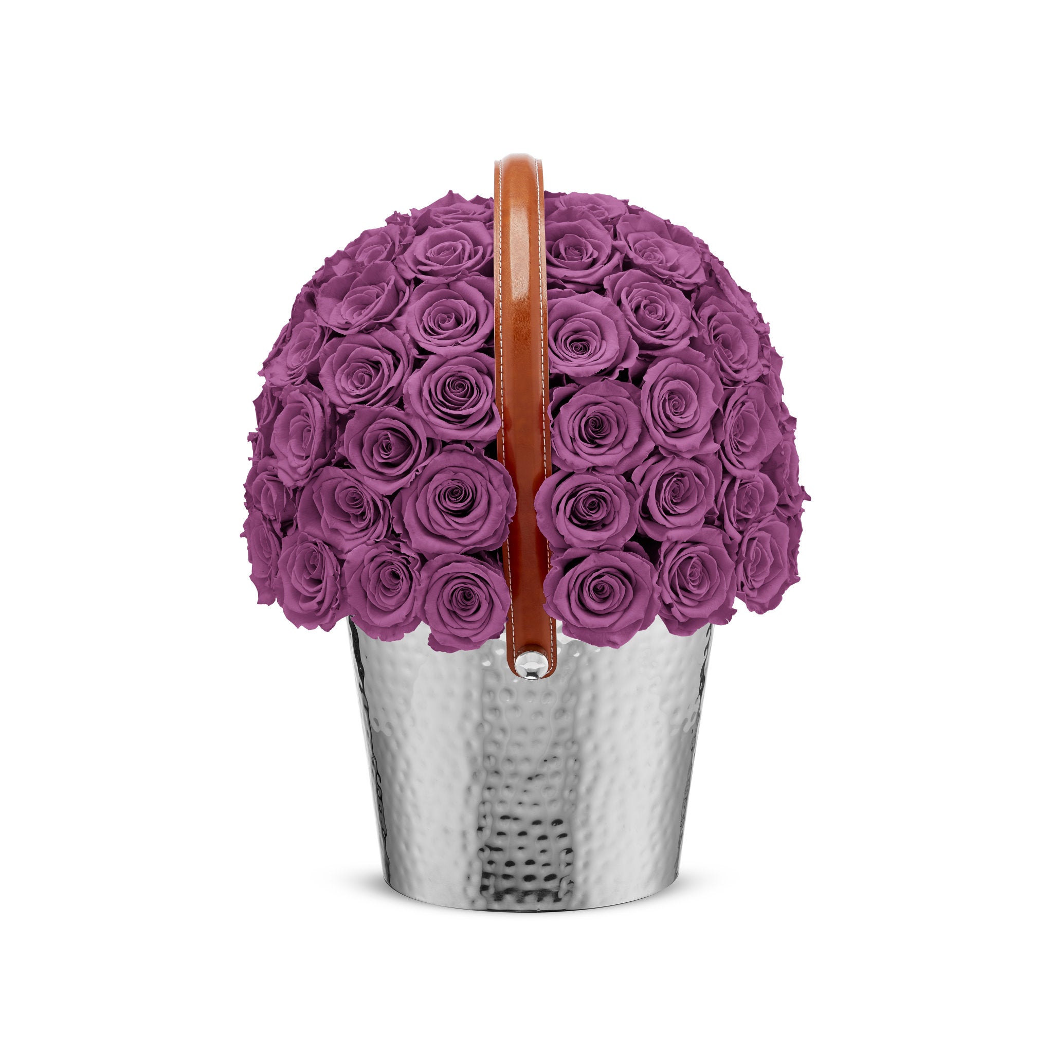 Silver bucket filled with purple roses on a white background