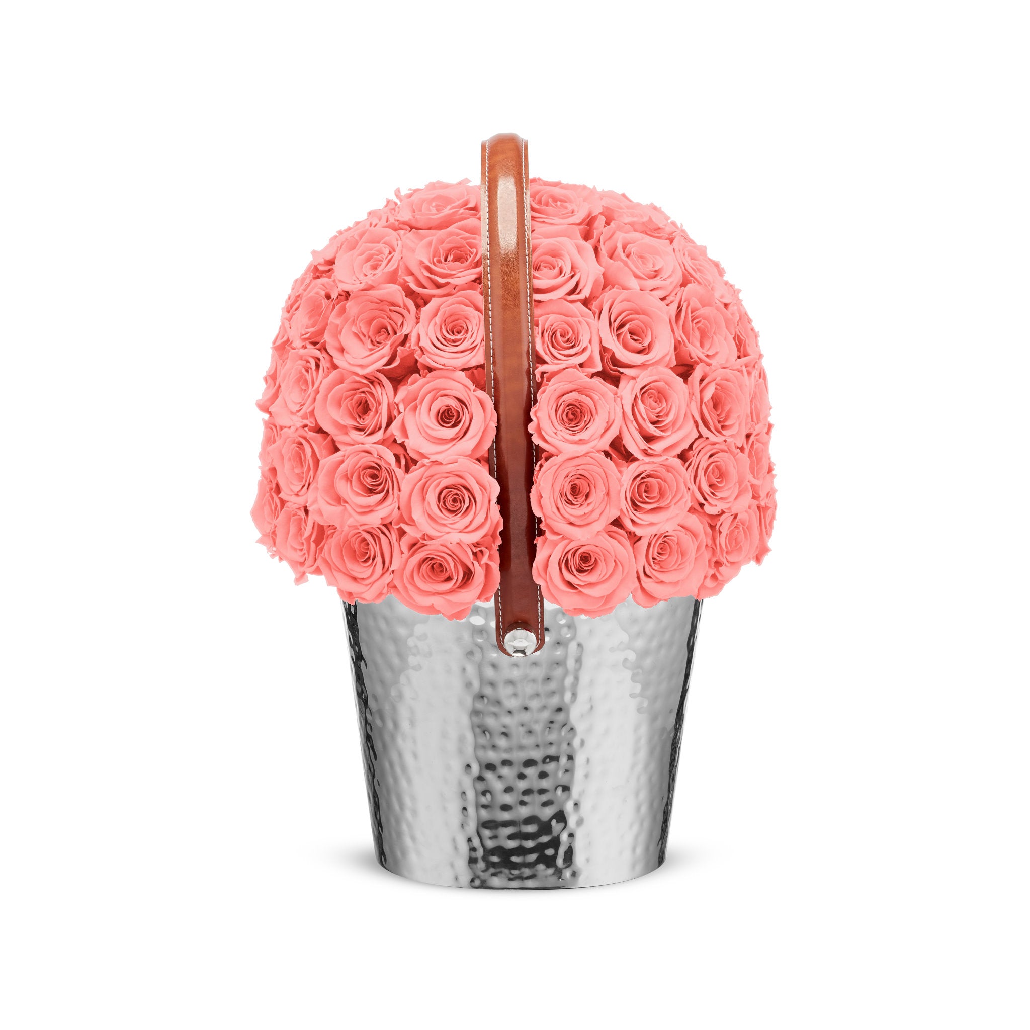 Pink rose arrangement in a metallic container on a white background