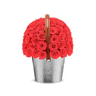Basket filled with red roses on a white background