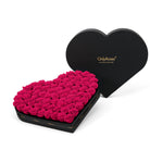 Heart-shaped box of pink roses with 'Only Roses' branding on a white background