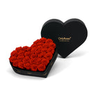 Heart-shaped box of red roses with 'OnlyRoses' branding on a white background