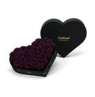 Heart-shaped box of purple roses with 'OnlyRoses' branding on a white background