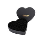 Heart-shaped black box with black roses and 'OnlyRoses' branding on a white background