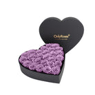 Heart-shaped box of purple roses with 'OnlyRoses' branding on a white background