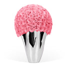 Silver vase with a large ball of Pink roses on a white background