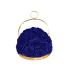 Gold basket with blue roses on a white background