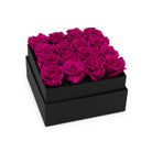 Black box with pink roses on a white background