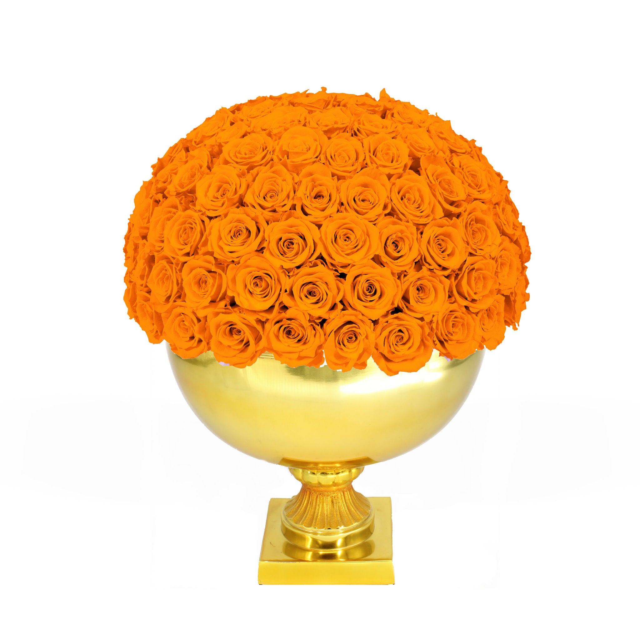 Spherical arrangement of orange roses on a gold pedestal against a white background