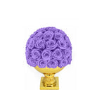 Purple rose ball on a gold pedestal against a white background