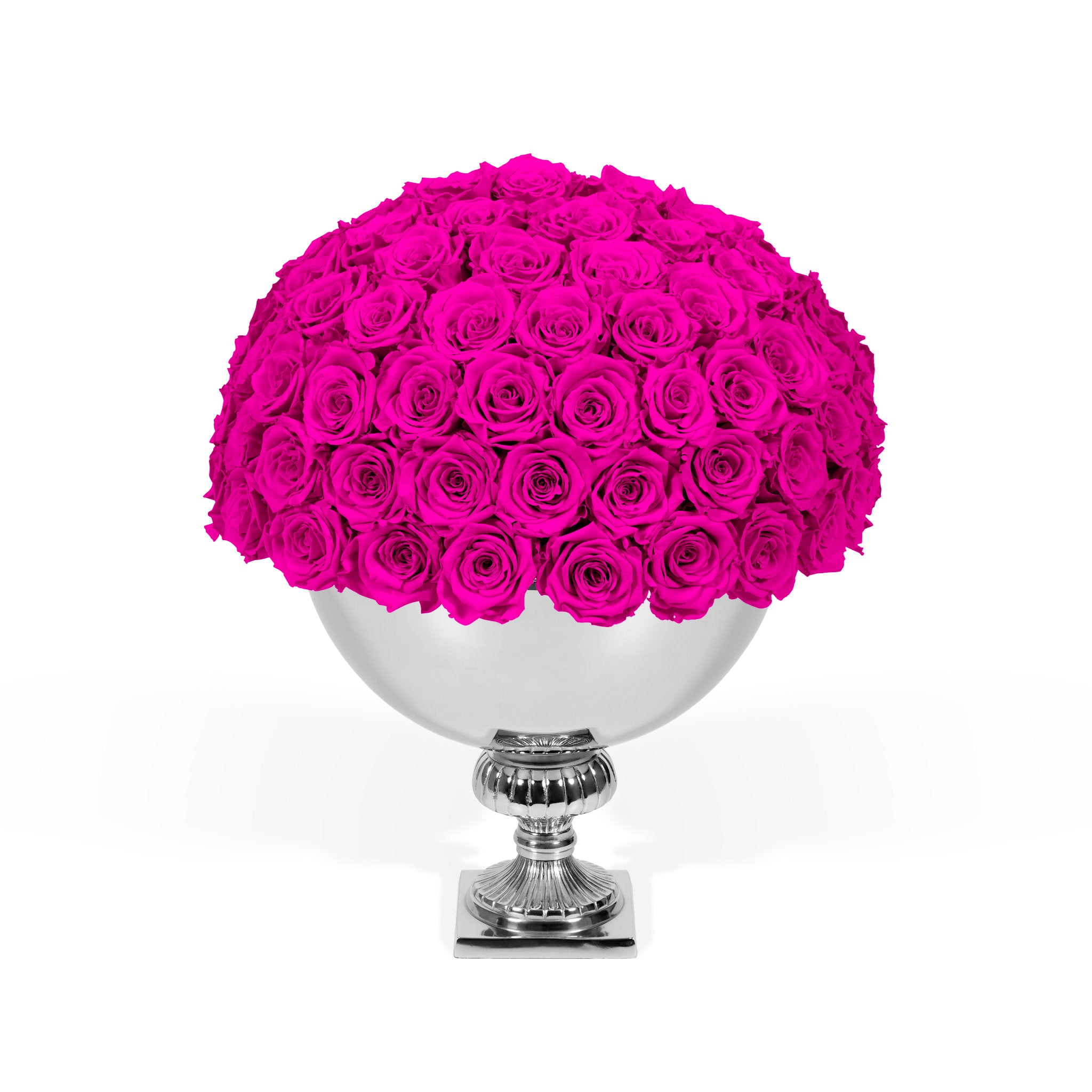 Spherical arrangement of pink roses in a silver vase on a white background