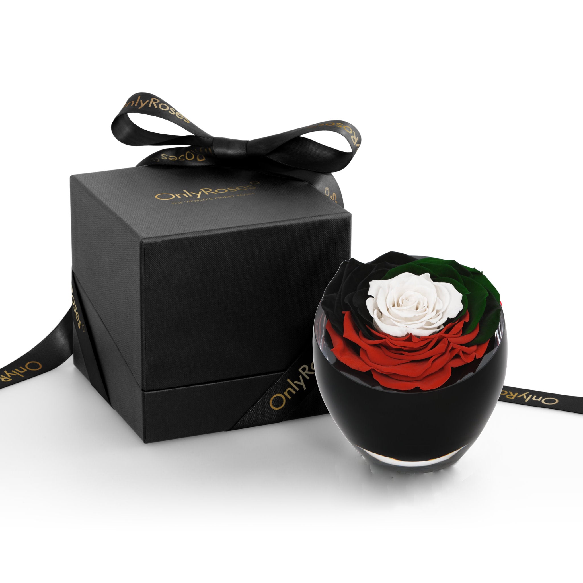 Black glass bowl with red and white roses next to a black gift box with 'Only Roses' branding.