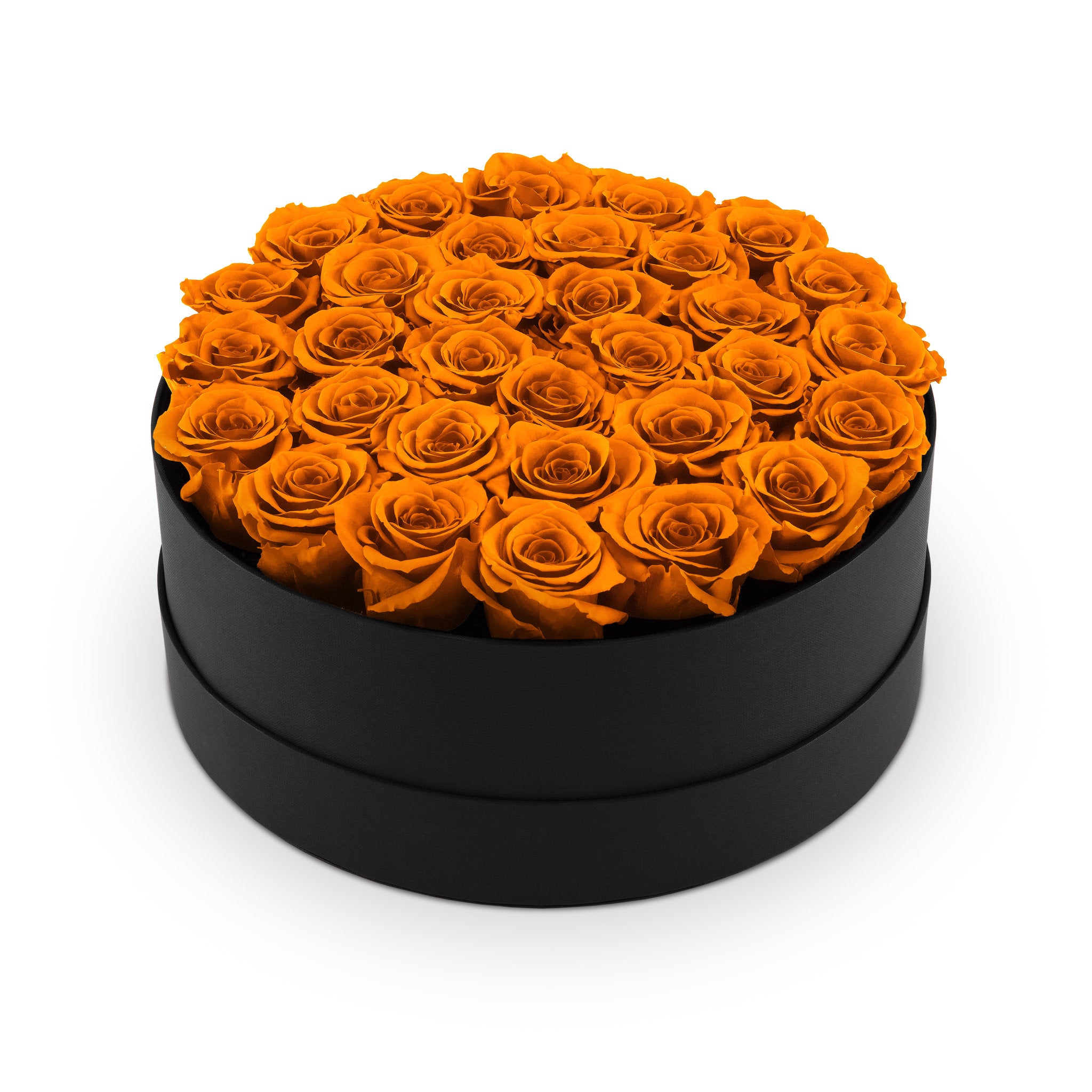 Black round box filled with orange roses on a white background