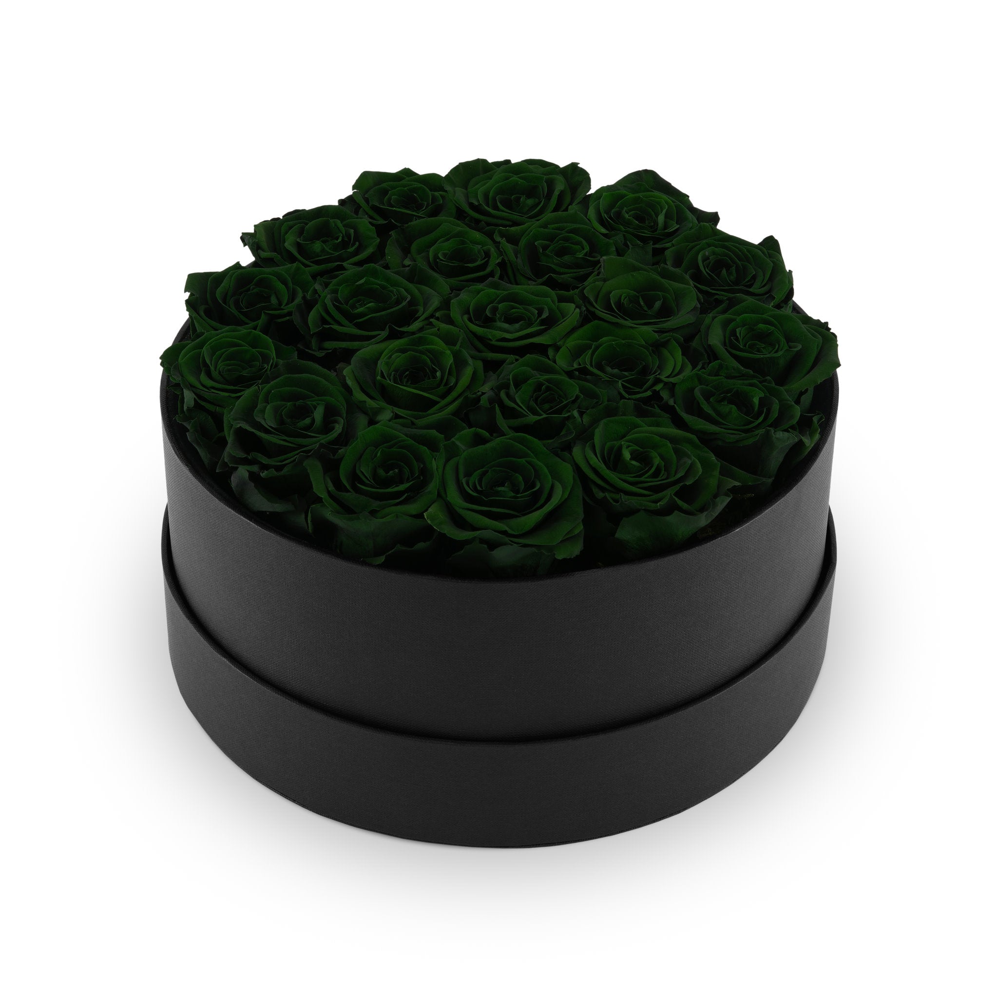 Black round box filled with dark green roses on a white background
