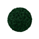Round arrangement of dark green roses on a white background