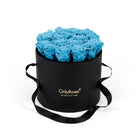 Black box with blue roses and 'Only Roses' logo on a white background