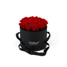 Black round box with redroses and 'Only Roses' logo on a white background