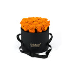Black box with orange roses and 'Only Roses' branding on a white background