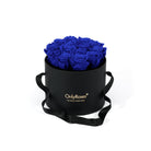 Black box with blue roses and 'Only Roses' branding on a white background