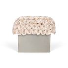 Floral arrangement in a box on a white background