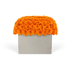 Decorative box with orange roses on a white background