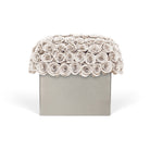 Clutch bag with floral top design on a white background