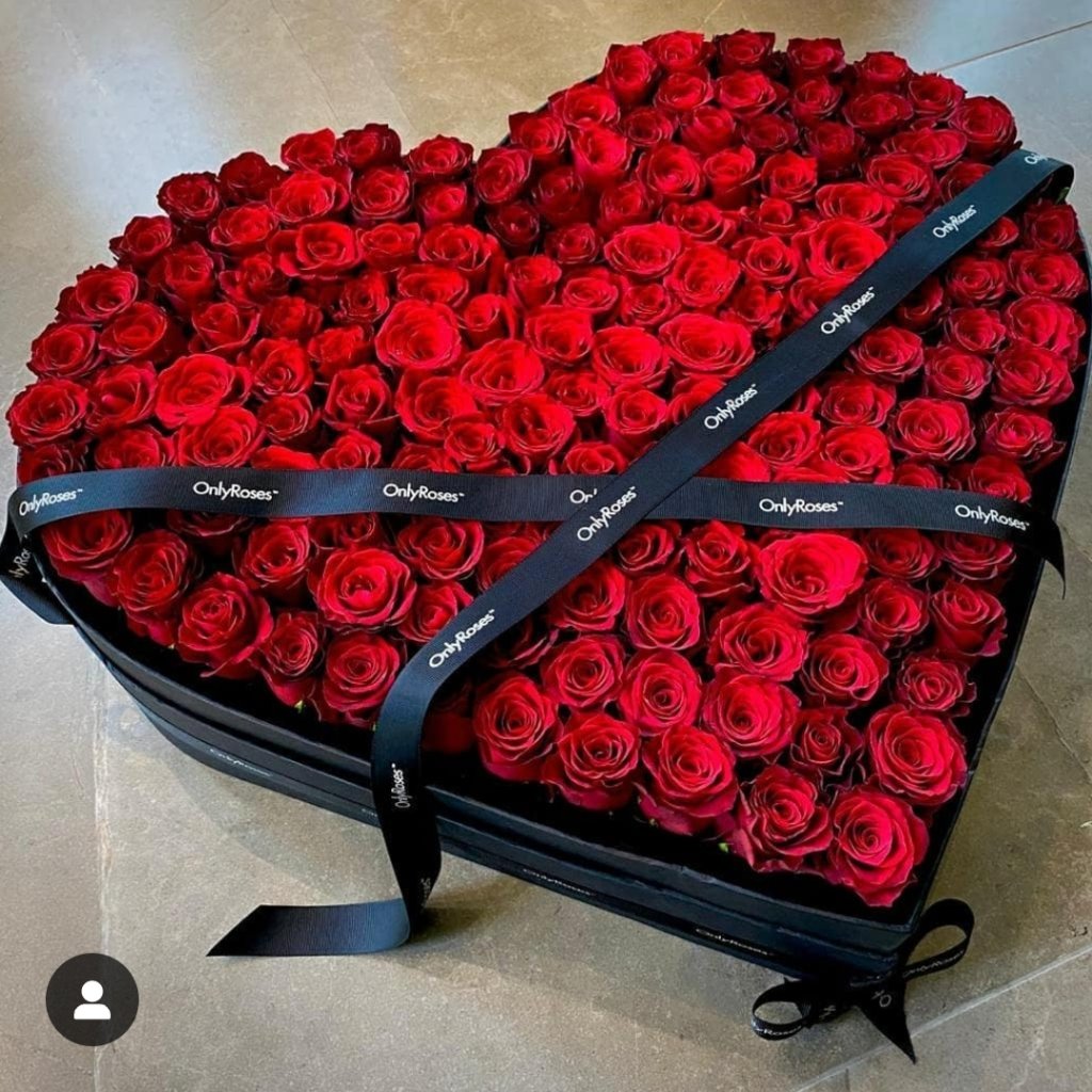 Heart-shaped box of red roses with 'OnlyRoses' branding on a beige background L Size